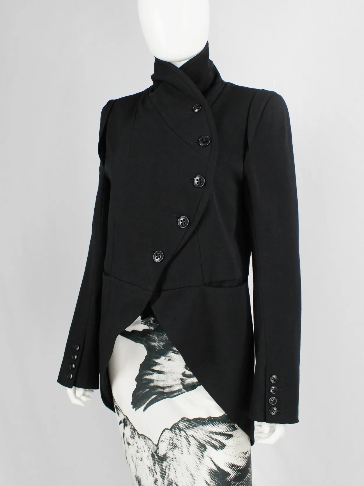 Ann Demeulemeester black cutaway tailcoat with curved buttoned front — fall 2006