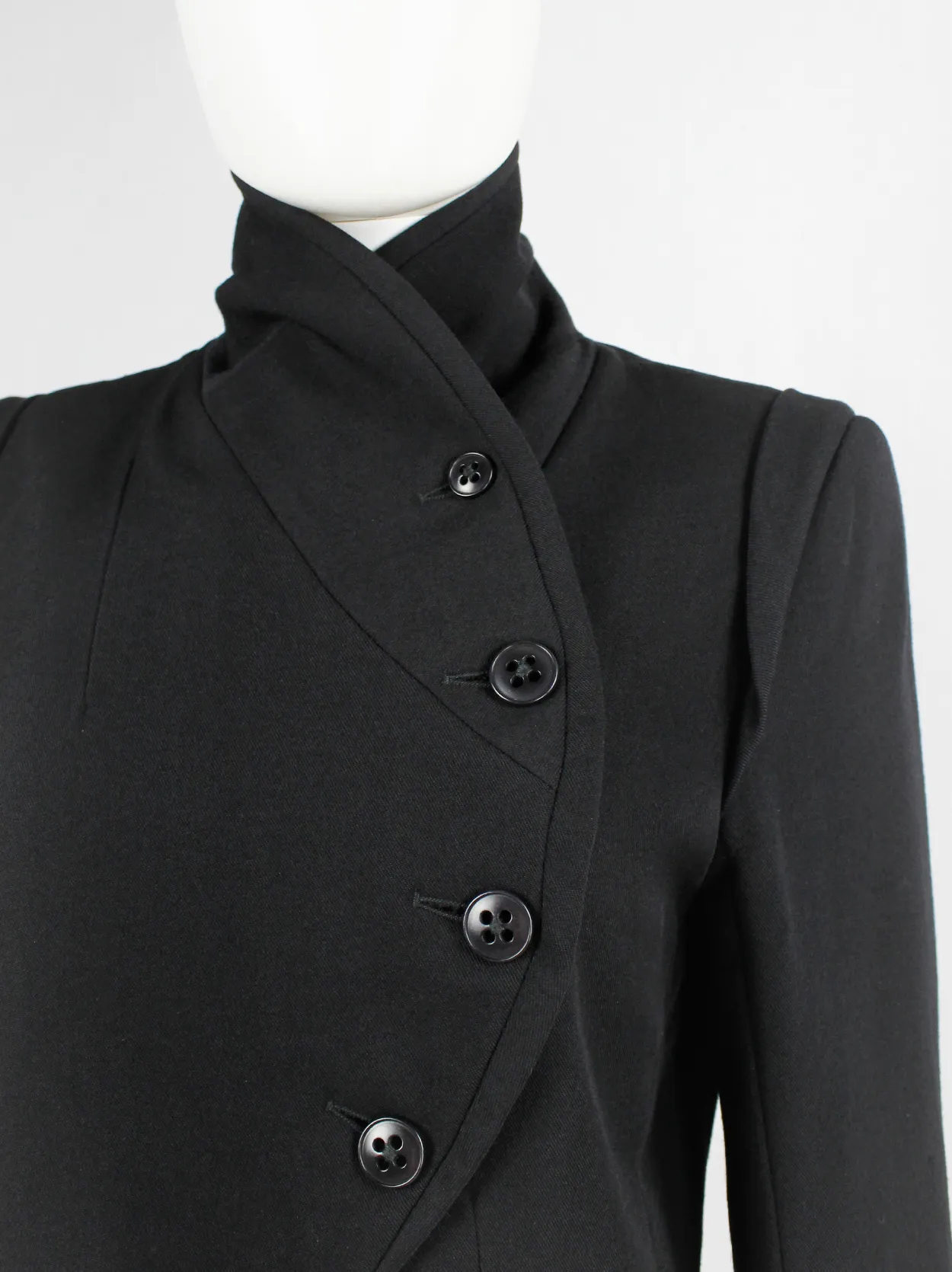 Ann Demeulemeester black cutaway tailcoat with curved buttoned front — fall 2006