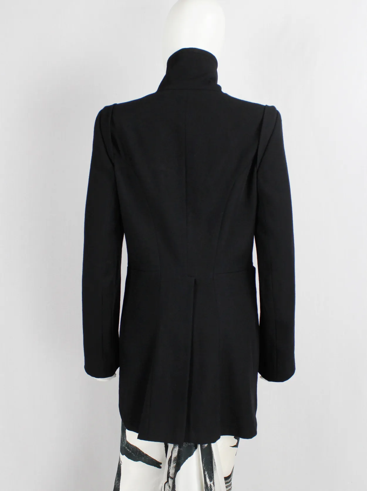 Ann Demeulemeester black cutaway tailcoat with curved buttoned front — fall 2006