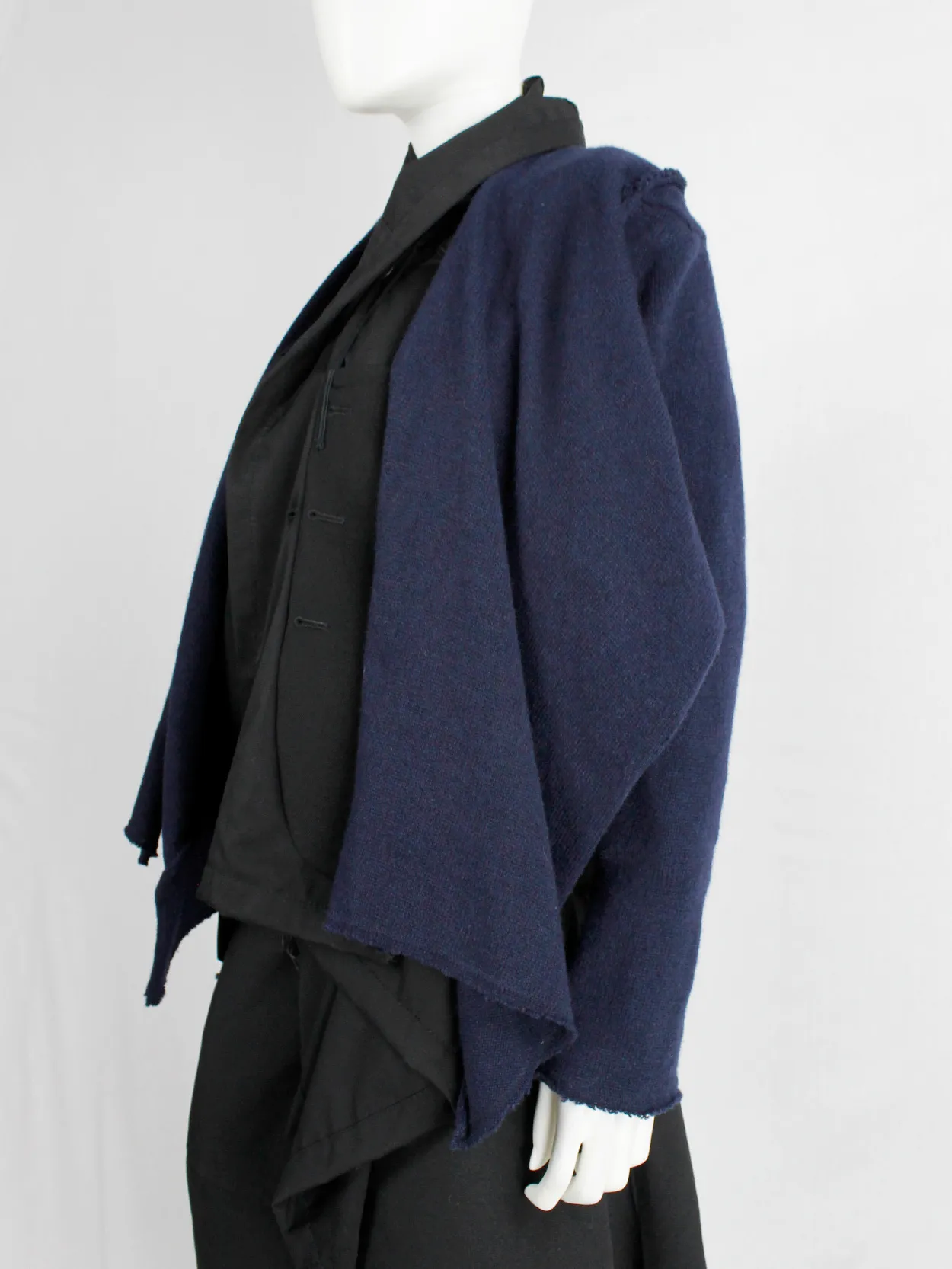 Comme des Garçons dark blue knit bolero with tied knot front closure — fall 2003