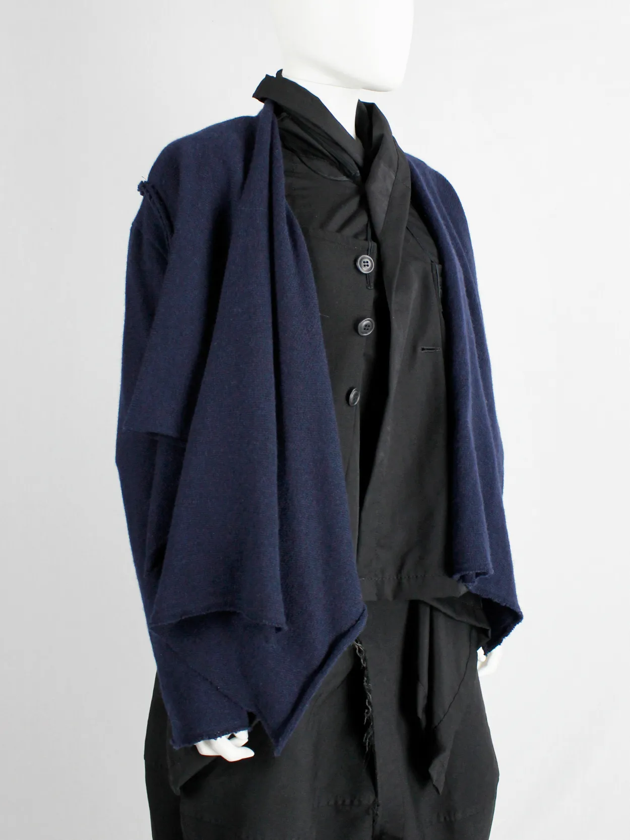 Comme des Garçons dark blue knit bolero with tied knot front closure — fall 2003