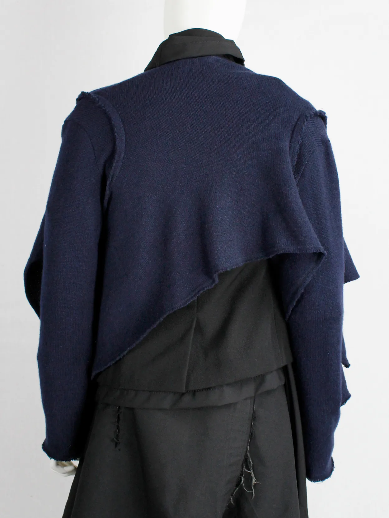 Comme des Garçons dark blue knit bolero with tied knot front closure — fall 2003